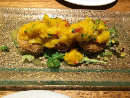 Our delicious appetizer at Greens Organic (cheese fried in quinoa with a mango cilantro salsa)