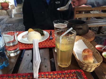 Alex's cast iron pot of stew and our yeast rolls