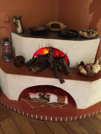 Showing how cuy (guinea pig) is cooked