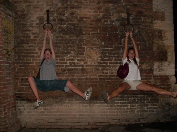My friend Hilary and I playing at the city gate in Siena in 2008