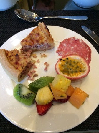 Delicious fruits and quiches at breakfast