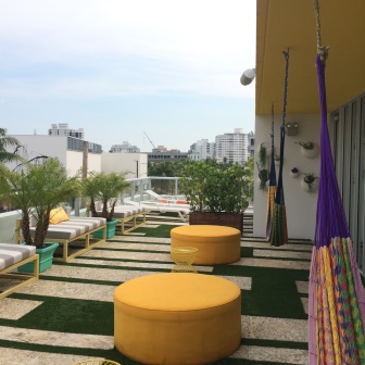 Pool level with lounging beds and hammocks